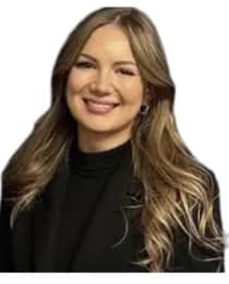 Headshot of Christina Wynia, smiling against a neutral background